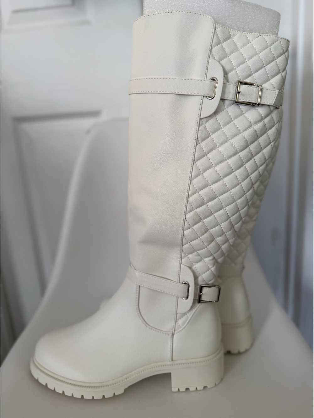 White quilted knee high boots